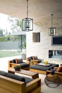 the-patio-complete-with-a-fireplace-and-james-perse-teak-furniture