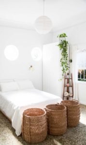 White bed with white lantern