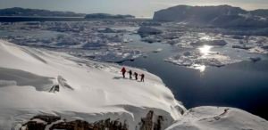 Snowshoeing near Sermermiut on the edge of the Ilulissat ice fjord in Greenland